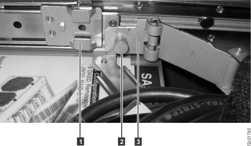 Releasing the cable management arm from the slide rail